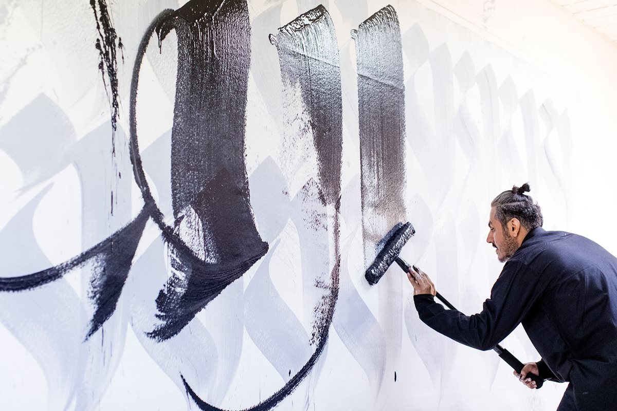 Artist Nugamshi creates a &ldquo;calligraffiti&rdquo; performance. &ldquo;I&rsquo;m searching for a contemporary spirit within the Arabic language,&rdquo; he says.