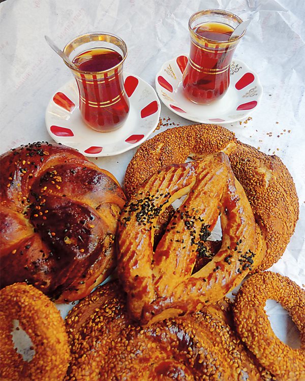 <em>Above:</em>&nbsp;Start the day with sesame seed-encrusted <em>simit</em> and sweet black tea; later on, try the city&rsquo;s best-known street dish, the iconic marinated mix of lamb and beef,&nbsp;<em>döner kebap</em>&nbsp;(&ldquo;turning roast&rdquo;),&nbsp;<em>lower.</em>