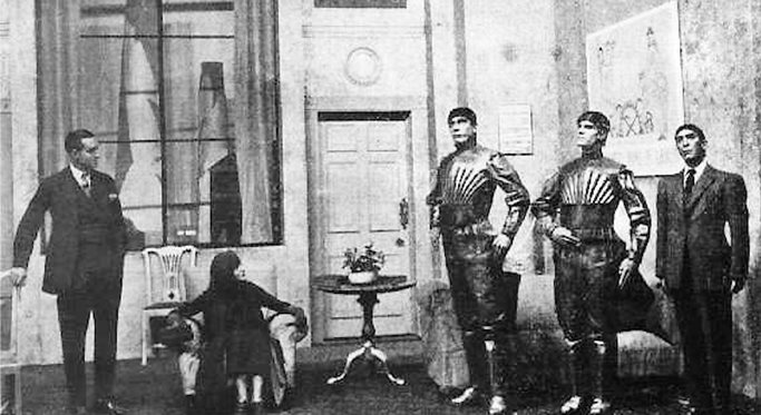 A scene from the play showing three robots—so called by apek to describe a new class of servant workers. 