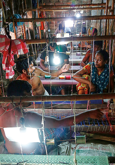 <p>Although muslin weaving is nearly non-existent today, pit-loom workshops such as this one in Sonargaon, near Dhaka, continue to produce <em>jamdani</em> saris, which most likely take their name from Persian words meaning a vase of flowers. Delicate yet far less fine than true muslin, jamdani is made by weavers who have kept alive the tradition of fine weaving in Bangladesh.<br />
Yet as one weaver pointed out wryly, he could earn twice as much in a factory, so &ldquo;being a weaver makes little sense. It&rsquo;s more a habit than a profession.&rdquo;</p>
