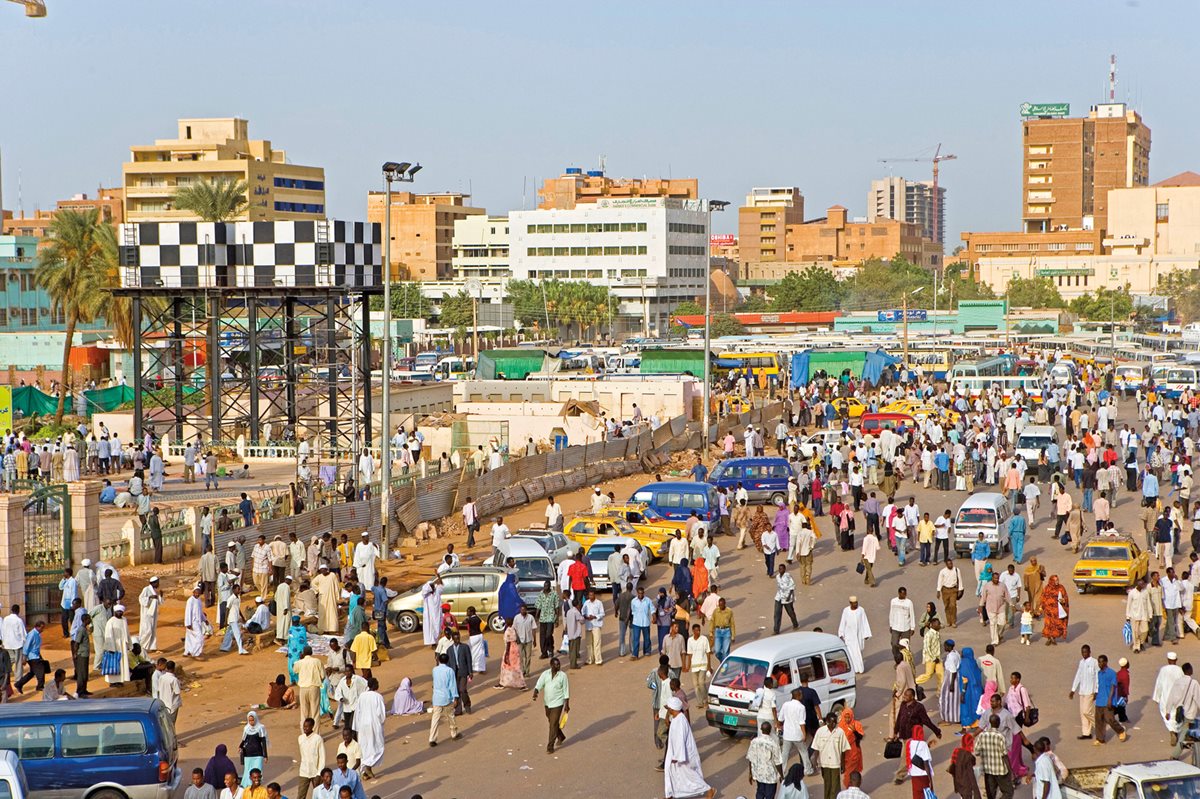 The population of Khartoum and its sister cities may soon touch 10 million, twice the number of a decade ago, at the current rate of growth. Here, the road is crowded near a major bus station close to the city&rsquo;s Great Mosque.&nbsp;