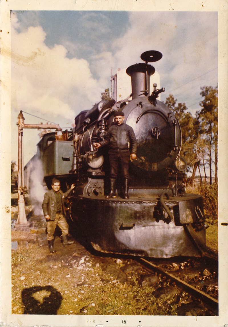 Posing alongside his engine in early 1975, train driver Assad Namrud, left, drove his last run the following year. Now 93, Namrud is the last living driver of the Beirut-Damascus railroad. 
