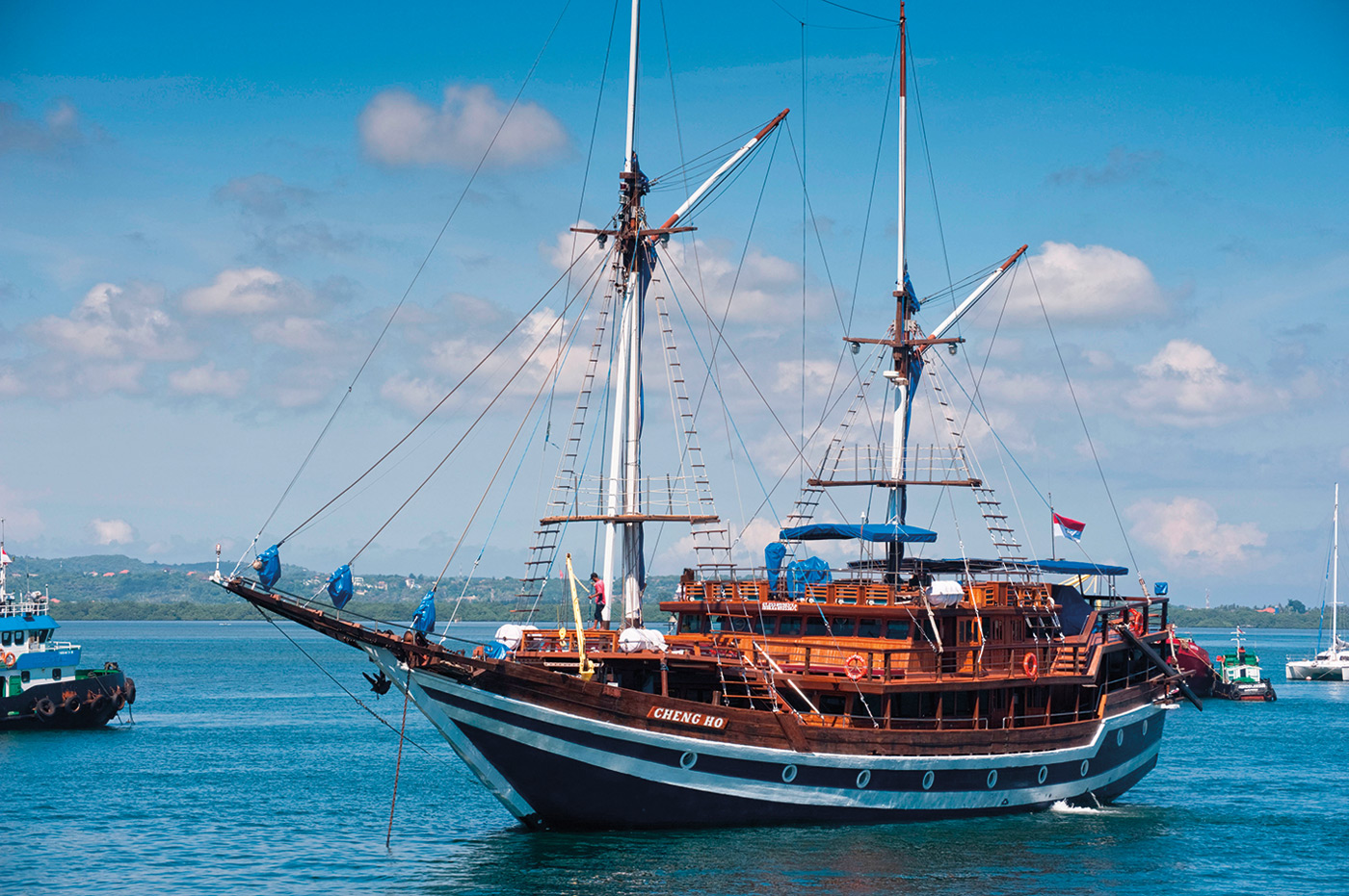Resting at anchor in Bali, the 33-meter, 24-passenger Cheng Ho is one of many relatively new pinisi offering live-aboard diving and sailing in waters open only to boats built and registered in Indonesia.