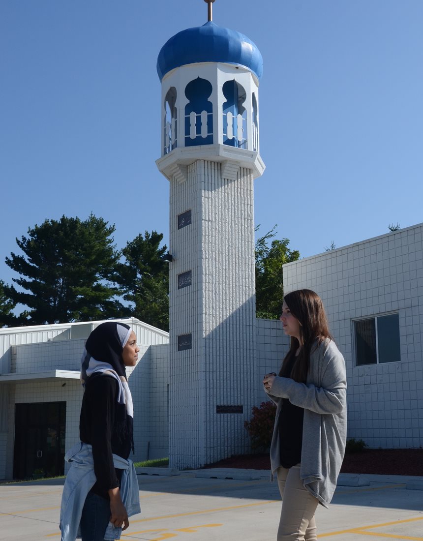 University of Iowa freshman and winner in the contest&rsquo;s Elkader High School Division, Samantha Wiedner, right, talks with Jefferson High School tenth grader Lena Osman outside of the Islamic Center of Cedar Rapids. &ldquo;Being intolerant to other cultures and religions isn&rsquo;t going to get us anywhere,&rdquo; Wiedner says. &ldquo;Despite all our differences, we should be able to co-exist.&rdquo;