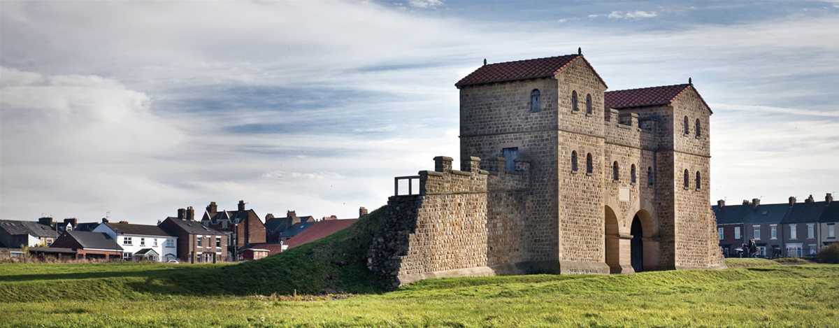 <p>Reconstructed as a museum in South Shields, the gate to what was once the Roman fort of Lugudunum stands at the mouth of the River Tyne. By the late third century <span class="smallcaps">ce</span>, the area around the fort was known as&nbsp; &ldquo;Arbeia&rdquo;&mdash;likely meaning &ldquo;Arab house,&rdquo; after boatmen from what is now Iraq were stationed there.</p>
