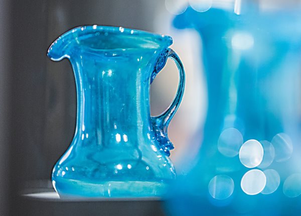 Early-20th-century glass pitchers, handblown in the city of Hebron, are among the displays. 