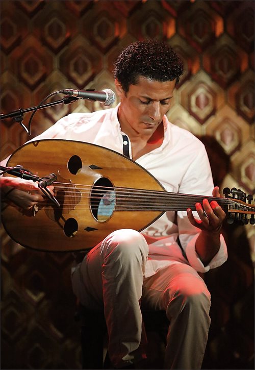 Egyptian ‘ud player, composer and musicologist Tarek Abdallah plays a modern ‘ud that is pear-shaped with sound holes in the soundboard and a bridge that secures 11 or 13 strings depending on the instrument.