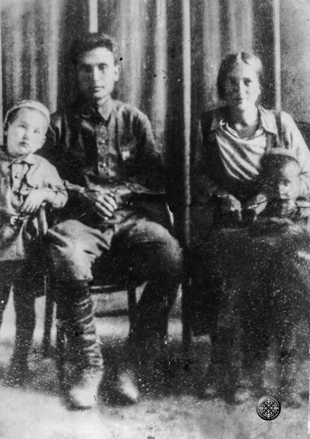 A family portrait of the Aitmatov family taken in the early 1930s. From left: a young Chingiz Aitmatov, his father, Törökul,&nbsp;and mother, Nagima, and younger brother, Ilgiz.