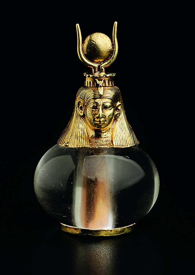 Nubia: Hathor also appears sculpted in gold above this crystal ball amulet likely produced during King Piye's reign. Though the treasures are separated by about 600 years, the depictions of Hathor, with her crown disk and horns, are remarkably similar. 