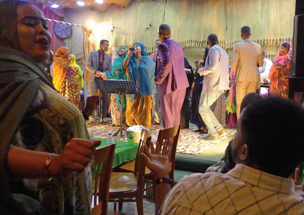 Singer Sahra Halgan, center, built the restaurant and club Hiddo Dhawr, whose name means &ldquo;save your culture,&rdquo; as a venue both for her own and others&rsquo; performances, during which it&rsquo;s not unusual to see the audience get up and dance alongside musicians onstage and even take selfies with Halgan. &ldquo;I was a nurse for the Somali National Movement during the war,&rdquo; says Halgan. When a patient &ldquo;had pain or was dying, we sang to the soldiers.&rdquo;