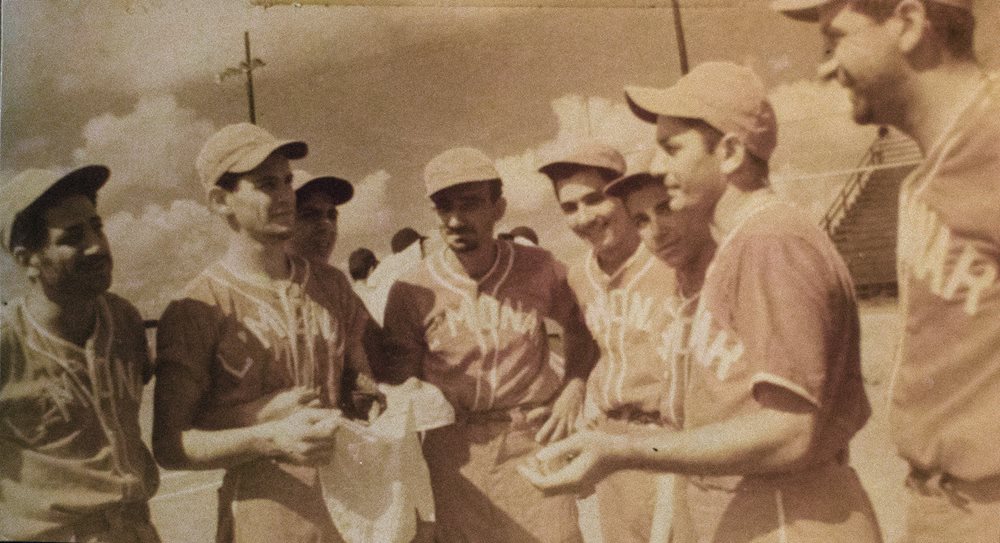 Among the many records of the team Anawaty collected and passed down to Karam is this photo from the 1930s, now tinted with age, showing the L’Monar players after a game.