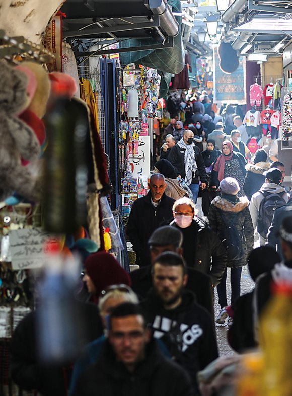 Among the busiest of Jerusalem’s lanes is Suq Khan al-Zeit. Most maps say it’s in the Muslim Quarter, but then again it has chapels, and it includes part of the Via Dolorosa, the centuries-old Christian pilgrimage route.