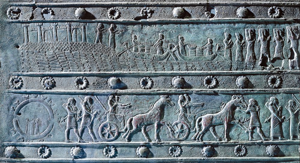 <p>Tooled in bronze around 853 <span class="smallcaps">bce</span>, this small relief panel is one of many chronicling the battles of Assyrian King Shalmaneser <span class="smallcaps">iii</span> against coastal city-states. Although it may literally depict Tyre, which was an island a few hundred meters offshore until Alexander the Great’s successors built a causeway to the mainland, the ferrying of goods and soldiers from a fortified island to the coast is applicable no less to Arwad, whose ruler took part that year in a coalition rebellion against Assyrian domination.</p>