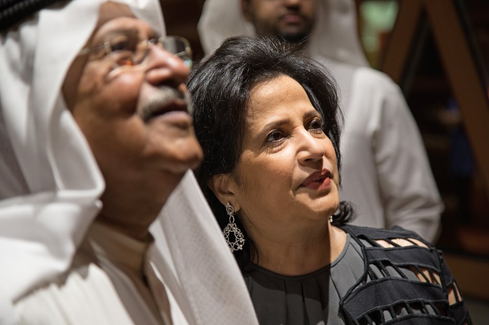 Shaikha Mai bint Mohammed Al-Khalifa, president of the Bahrain Authority for Culture and Antiquities and the driving force behind the establishment of the Pearling Path, stands alongside Bahraini journalist and poet Hassan Kamal at the inauguration of Al-Khalifiyah Library in the old city center of Muharraq in April.