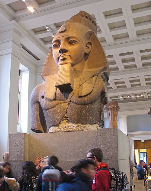 Prize fragment of the full-length original, the bust of Pharaoh Ramses <span class="smallcaps">ii</span> proved the first of many heavyweight artifacts acquired for Britain by Giovanni Battista Belzoni, whose portrait in Arab attire, <i>top banner</i>, hangs in the Archaeological and Art Museum in his home city of Padua, Italy.