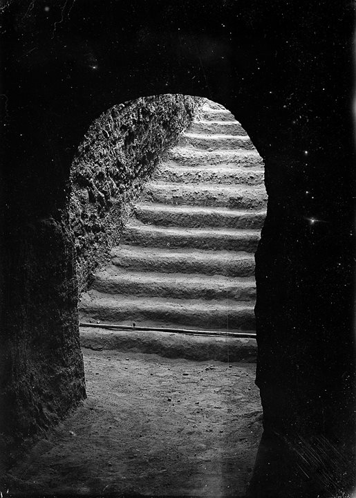 Demonstrating his understanding of light, Ibrahim sought the best times of day to photograph aspects of the sites and how best to capture details in the highlights and shadows, as shown in this 1918 photo of the Nuri Pyramid 52 entrance stairway. 