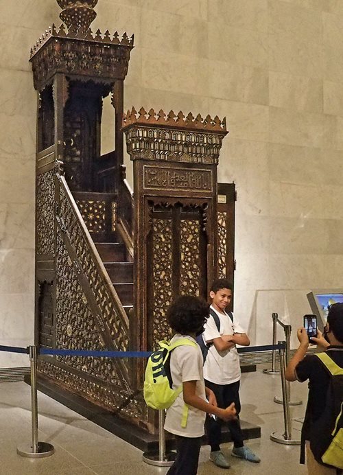 The minbar of the Mosque of Abu Bakr bin Mazhar was built in 1480 out of ebony and mahogany. In 2018 it was moved from the mosque of its founder to become part of the permanent display at Cairo’s Museum of Egyptian Civilization, where it represents the heritage of Mamluk woodcraft.
